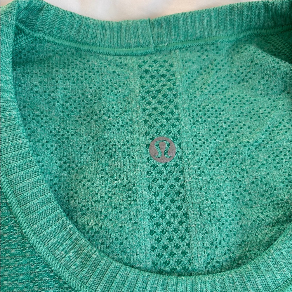 Lululemon's pretty teal green shirt size 10 women